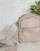 Freez_Beige_Crossbody_Front_Zip